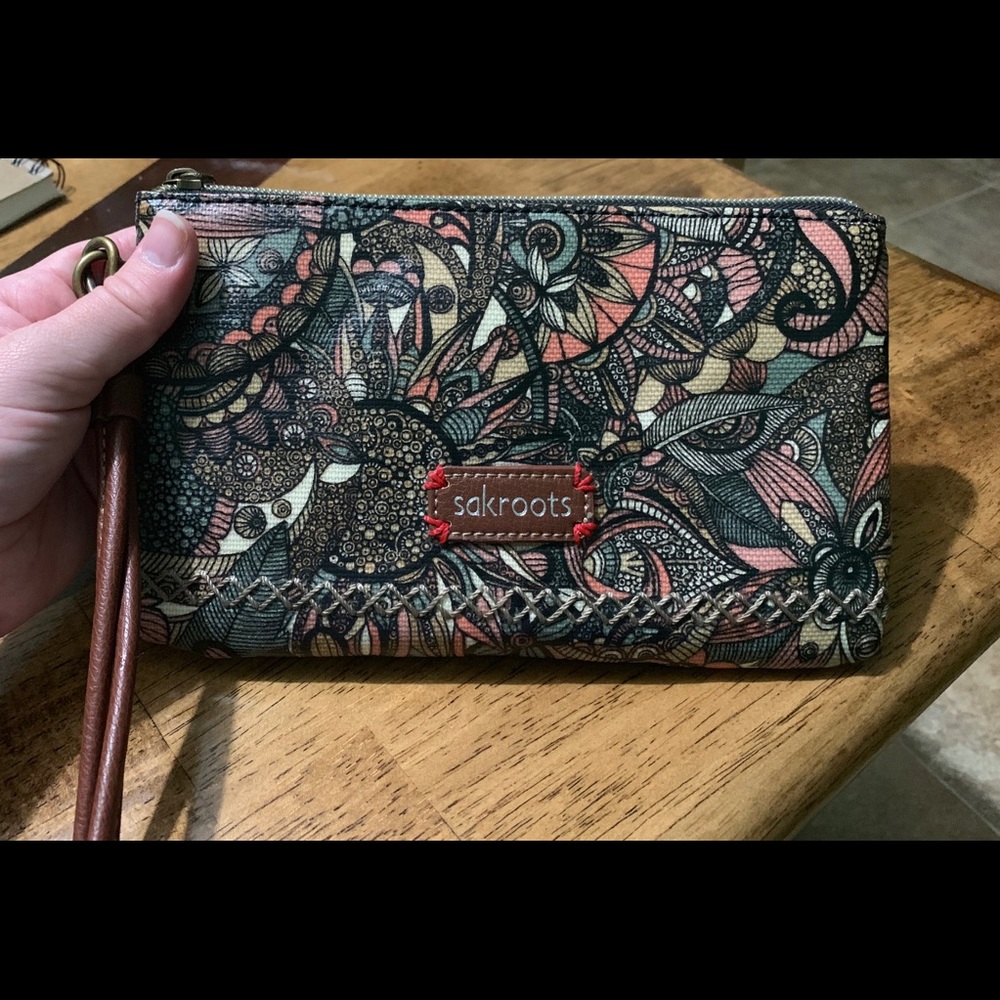 Sakroots wristlet with built in power bank!